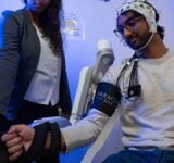 Researchers in the US are attempting to connect data from sensors monitoring the brain, muscles and movement with a wearable exoskeleton.